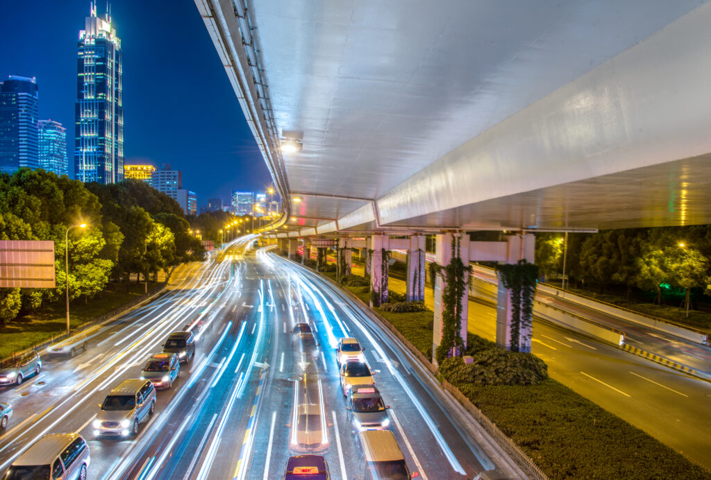 city view at night with traffic and trail light.